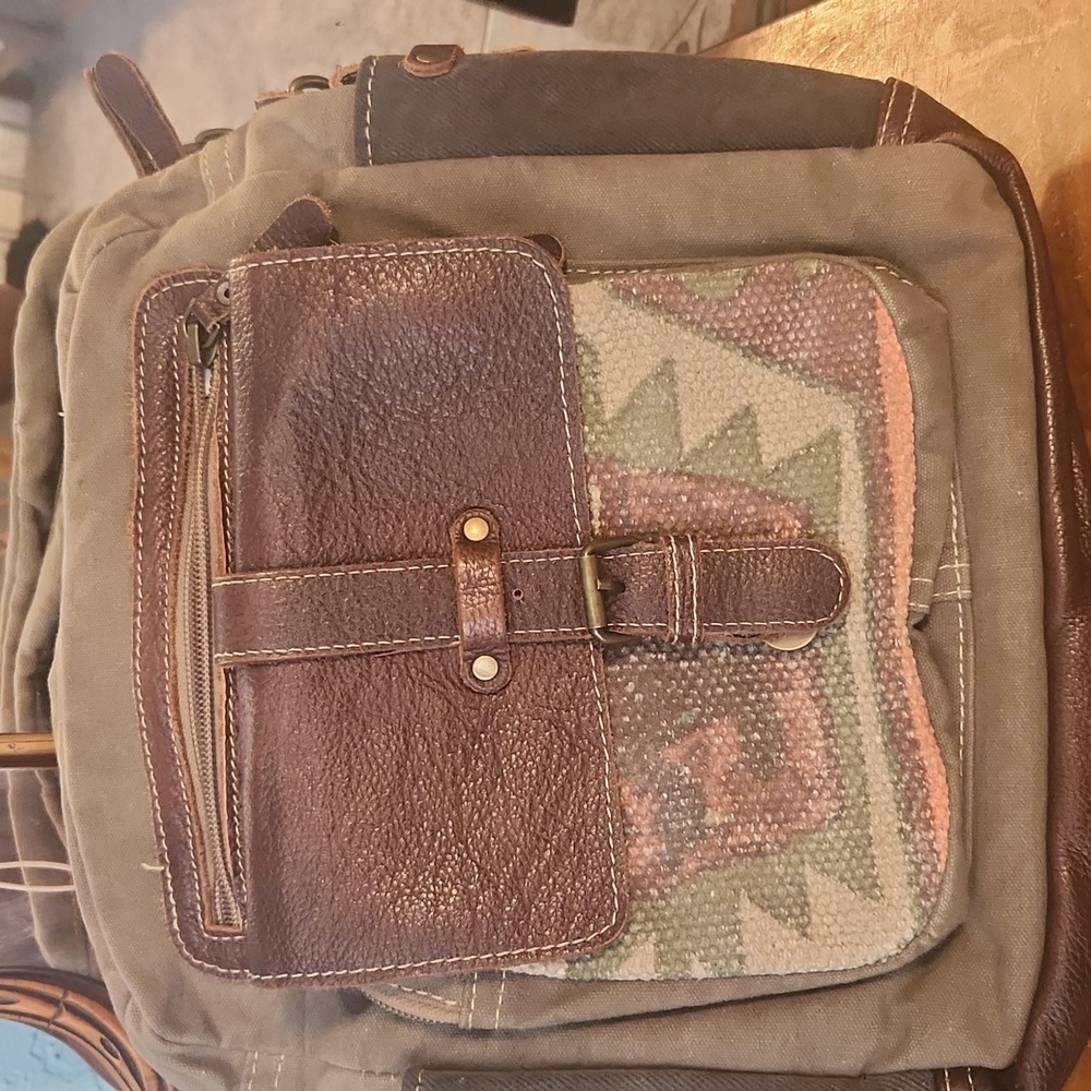 Like new Myra Bag 12x12x4 lots of  and pockets. Shoulder strap